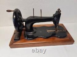 1874 Singer New Family 12 hand crank Sewing Machine with wooden case