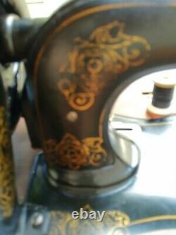 1878 Singer Sewing Machine 12 New Family Fiddle Base on it's original cabinet
