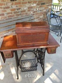 1894 Singer Model 27 Treadle Sewing Machine with Sphnix Motif and CoffinTop