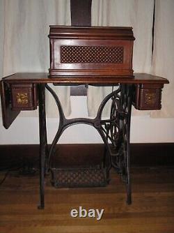 1894 Singer Model 27 Treadle Sewing Machine with Sphnix Motif and CoffinTop