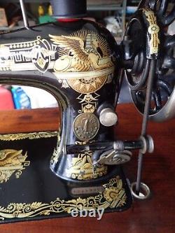 1894 Singer Model 27 Treadle Sewing Machine with Sphnix Motif and CoffinTop