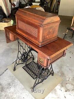 1894 Singer Model 27 Treadle Sewing Machine with Sphnix Motif and CoffinTop