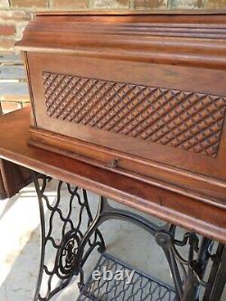 1894 Singer Model 27 Treadle Sewing Machine with Sphnix Motif and CoffinTop