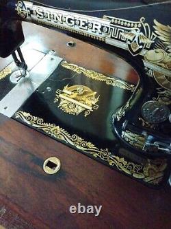 1894 Singer Model 27 Treadle Sewing Machine with Sphnix Motif and CoffinTop