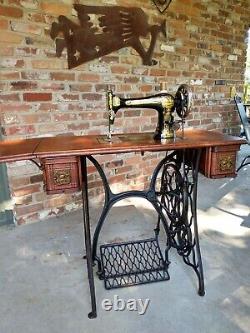 1894 Singer Model 27 Treadle Sewing Machine with Sphnix Motif and CoffinTop