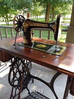 1894 Singer Model 27 Treadle Sewing Machine with Sphnix Motif and CoffinTop