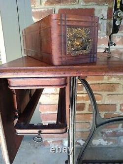 1894 Singer Model 27 Treadle Sewing Machine with Sphnix Motif and CoffinTop