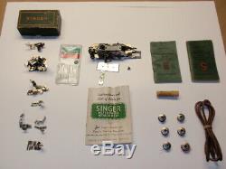 1909 Singer Sewing Machine fully operational with cabinet & original manuals