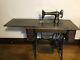 1910 Vintage Singer Red Eye Sewing Machine With Oak Cabinet. Has Belt And Works