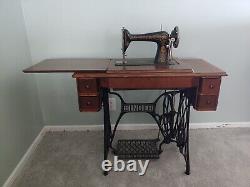 1920 Singer sewing machine, Model 66 Red Eye with Treadle Cabinet