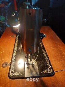 1949 Singer Sewing Machine Model 66 in cabinet, great shape