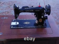 1949 Singer Sewing Machine Model 66 in cabinet, great shape