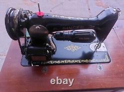 1949 Singer Sewing Machine Model 66 in cabinet, great shape