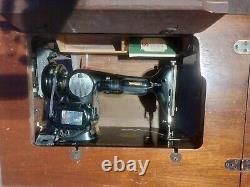 1949 Singer Sewing Machine Model 66 in cabinet, great shape