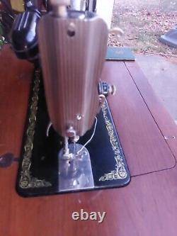 1949 Singer Sewing Machine Model 66 in cabinet, great shape