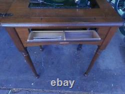 1949 Singer Sewing Machine Model 66 in cabinet, great shape