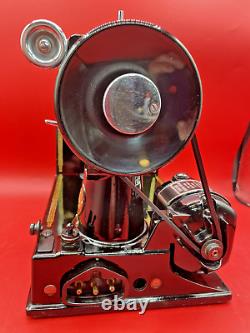 An Exceptionally Clean 1953 Singer Featherweight with a lot of accessories & case