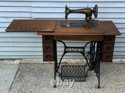 Antique 1910 Singer Sewing Machine with Treadle Oak Cabinet Cast Iron Base