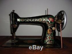 Antique 1913 Singer treadle sewing machine withOriginal Cabinet Red Eye Model 66-1