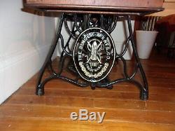 Antique 1913 Singer treadle sewing machine withOriginal Cabinet Red Eye Model 66-1