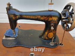 Antique Improved Family Singer Sewing Machine in treadle cabinet, Working