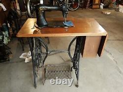 Antique Improved Family Singer Sewing Machine in treadle cabinet, Working