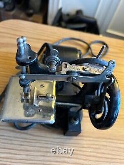 Antique Miniature Motorized Child's Singer sewing machine