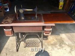 Antique SINGER sewing machine with rare Victorian foot pedal and Cabinet Table