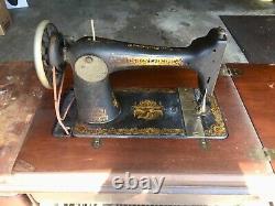 Antique SINGER sewing machine with rare Victorian foot pedal and Cabinet Table