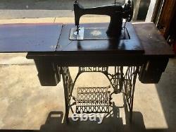 Antique SINGER sewing machine with rare Victorian foot pedal and Cabinet Table