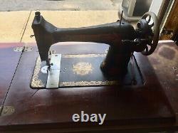 Antique SINGER sewing machine with rare Victorian foot pedal and Cabinet Table