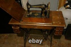 Antique Singer 127 Sphinx Treadle Sewing Machine Model with bench 1920's