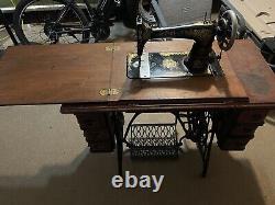 Antique Singer 1912 Foot Pedal Sewing Machine Beautiful Wooden CabinetOn Wheels