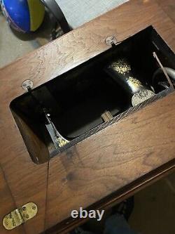 Antique Singer 1912 Foot Pedal Sewing Machine Beautiful Wooden CabinetOn Wheels