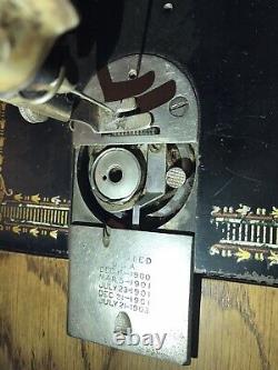 Antique Singer Black Treadle Sewing Machine with Original Cabinet