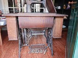 Antique Singer Red Eye Treadle Sewing Machine in Cabinet Circa 1910 1916