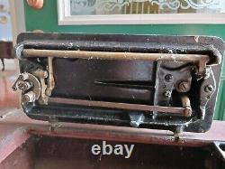 Antique Singer Red Eye Treadle Sewing Machine in Cabinet Circa 1910 1916
