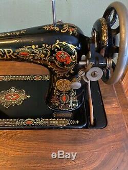 Antique Singer Sewing Machine In Cabinet