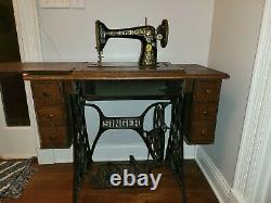 Antique Singer Sewing Machine Model 66/ plus Oak Cabinet 1920's