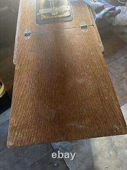 Antique Singer Sewing Machine With Cabinet
