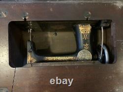Antique Singer Sewing Machine in Cabinet