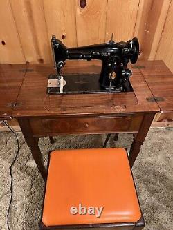 Antique Singer Sewing Machine in Cabinet