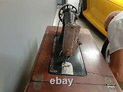 Antique Singer Sewing machine model 66 Treadle Oak Cabinet born 11/1929
