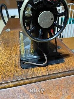 Antique Singer Treadle Sewing Machine Model 66 Red Eye in Cabinet