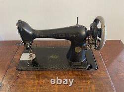 Antique Singer Treadle Sewing Machine circa 1910 with Extras (Belts, Needles)