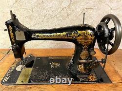 Antique Singer Treadle Sewing Machine in 4 drawer Cabinet-Early 1900's