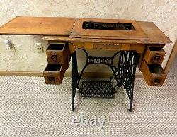 Antique Singer Treadle Sewing Machine in 4 drawer Cabinet-Early 1900's