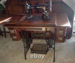 Antique Singer Treadle Sewing Machine in Oak Cabinet 1890's