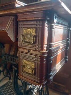 Antique Singer Treadle Sewing Machine in Oak Cabinet 1890's