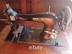 Antique Singer Treadle Sewing Machine in Oak Cabinet 1890's